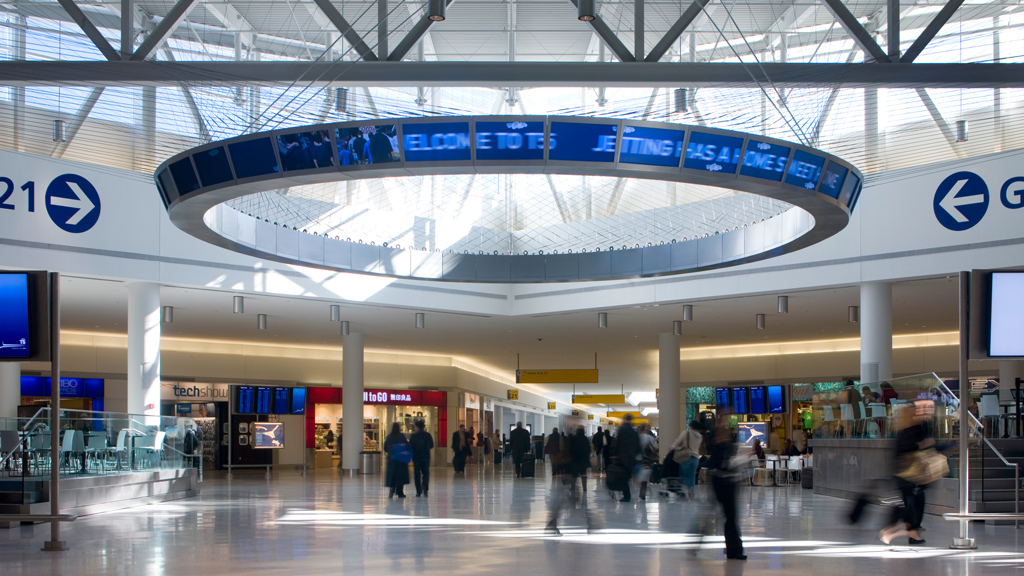 A group of people in a large building.