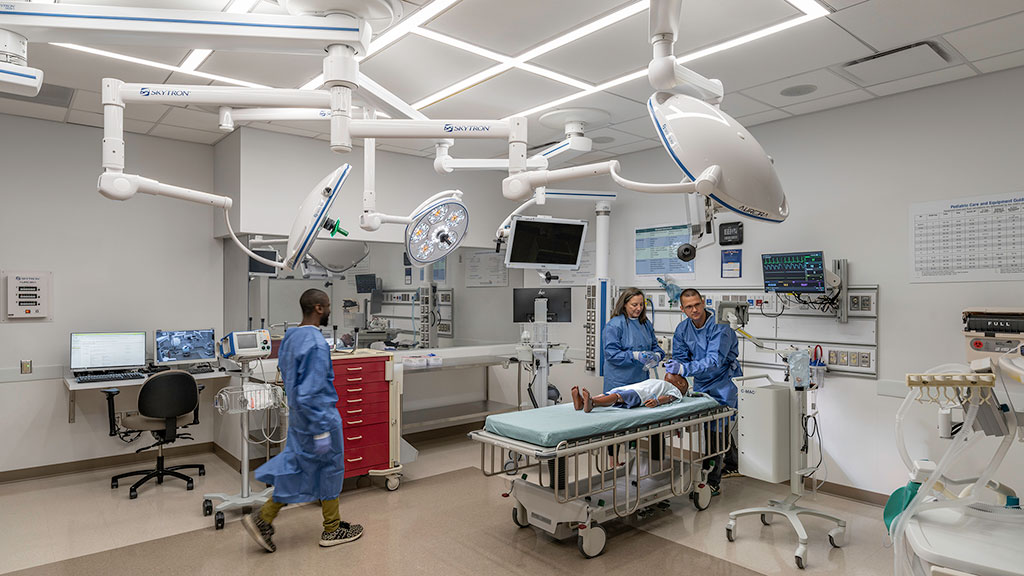 A group of people in a hospital.